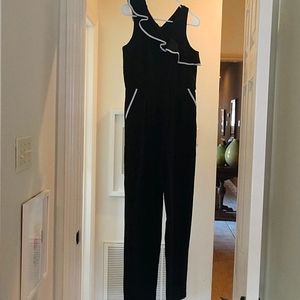 GB Girls black romper with white trim